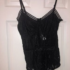Forever 21 lace bodysuit in the colour black. Size L.